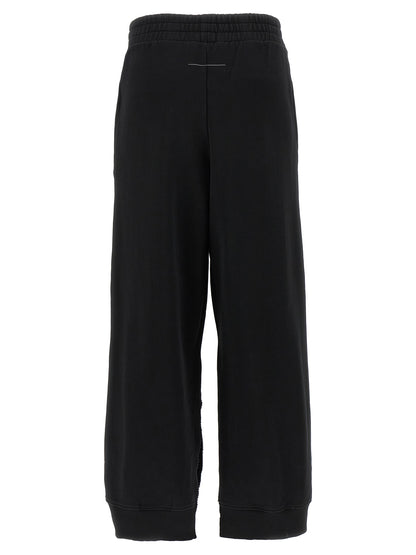 Joggers by MM6 Maison Margiela for women in cotton black, white, signature & print features an sophisticated high rise and wide with a precise long, creating a sophisticated and sophisticated silhouette.