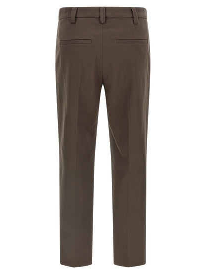 Trousers by Brunello Cucinelli for women in stretch cotton brown & striped features an sartorial silhouette, showcasing a precise straight-leg and long with a sartorial for a refined look.