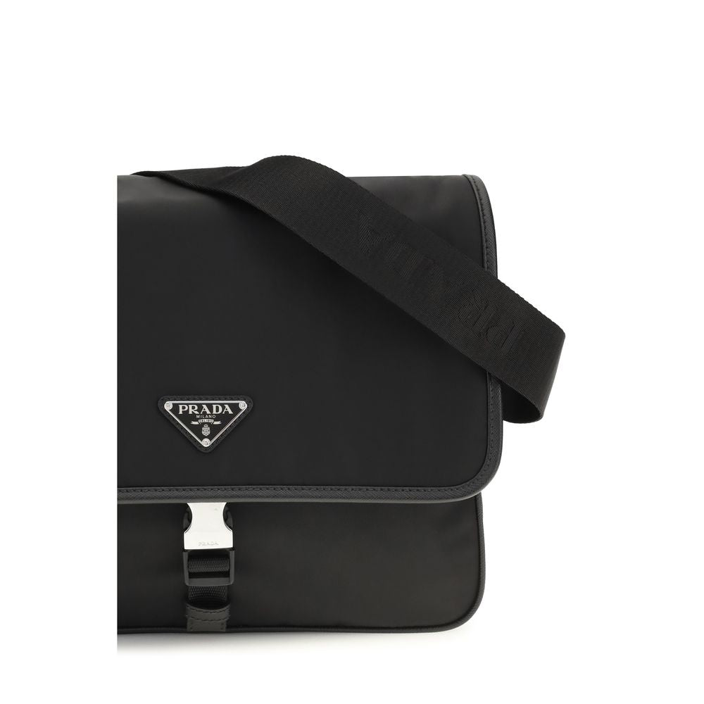 Shoulder Flap Bag by Prada for men in polyamide polyester nylon leather & viscose black & signature features a effortless chic silhouette with a secure snap, flap & zipper, ample , and versatile shoulder-strap & adjustable-strap for a effortless chic finish.