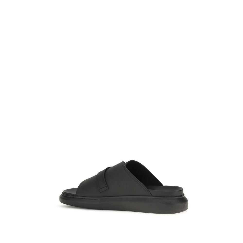 Platform Slider Sandals by Alexander McQueen for men in bos taurus calf leather and black presents a captivating silhouette, showcasing the signature style of the Men's Bos Taurus Calf Leather Platform Slider Sandals with a captivating platform and captivating .