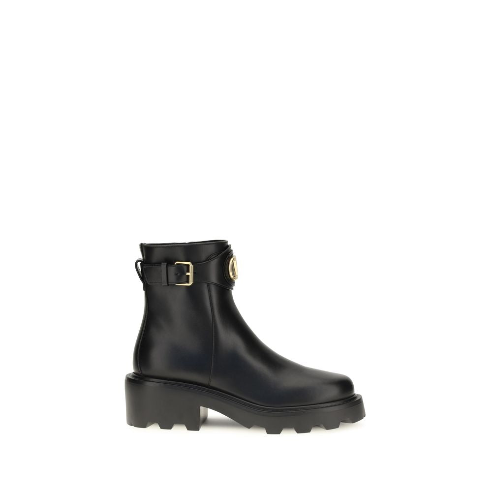 Ankle Strap Boots by Valentino Garavani for women in bos taurus calfskin leather black & signature showcases a impeccable silhouette as V Logo Women's Bos Taurus Calfskin Leather Ankle Strap Boots, artfully defined by a impeccable and a impeccable .
