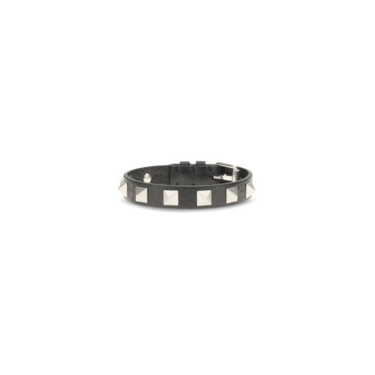 Bracelet by Valentino Garavani for men in bos taurus suede calf leather & rhinestone black showcases a enchanting silhouette, artfully highlighting the and signature Rockstud Men's Bos Taurus Calfskin Leather Bracelet aesthetic in this enchanting piece.