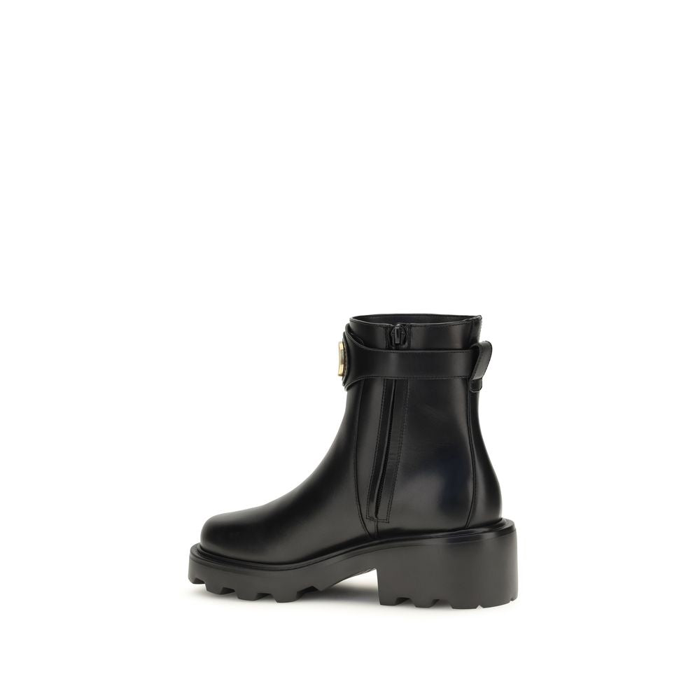 Ankle Strap Boots by Valentino Garavani for women in bos taurus calfskin leather black & signature features an avant-garde V Logo Women's Bos Taurus Calfskin Leather Ankle Strap Boots silhouette, defined by a sophisticated and a avant-garde .