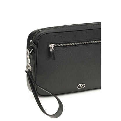 Pouch Handbag by Valentino Garavani for unisex in bos taurus calf leather black & signature features a contemporary silhouette, showcasing a secure zipper, ample , and contemporary wristlet for a sophisticated look.