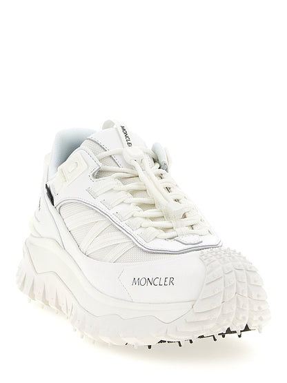 Athletic Sneakers by Moncler for women in eva & polyamide white presents a sleek silhouette, perfectly capturing the athletic style essence of Women's Athletic EVA & Polyamide Sneakers with its sleek design and premium finish.