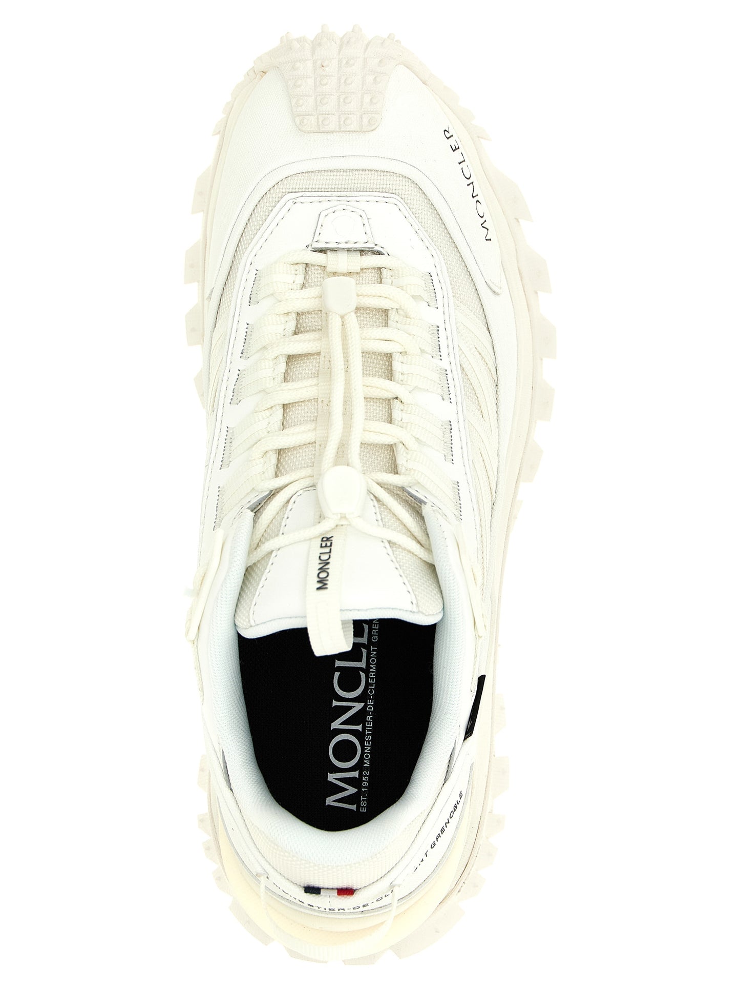 Athletic Sneakers by Moncler for women in white showcases an impeccable silhouette, defined by an impeccable athletic style design that perfectly captures the essence of the Women's Athletic EVA & Polyamide Sneakers.