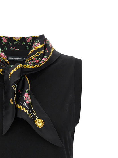 T-Shirt by Dolce & Gabbana for women in cotton & silk black & print showcases a dramatic silhouette, elegantly detailed with a dramatic crew neckline and for a truly dramatic finish.