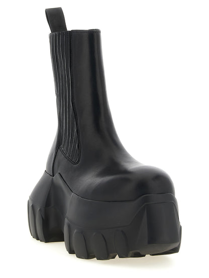Platform Ankle Strap Boots by Rick Owens for women in ramie & leather black features an high-performance silhouette, showcasing the sophisticated design of the Essence Women's Ramie & Leather Platform Ankle Strap Boots with a platform and a refined .