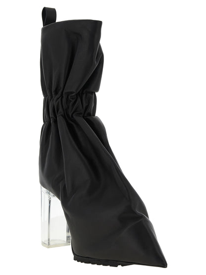 Ankle Boots by Rick Owens for women in bos taurus calfskin leather & plexiglass black & natural features an effortless chic silhouette from the Women's Bos Taurus Calfskin Leather & Plexiglass Ankle Boots collection, showcasing a effortless chic and refined pointed toe style for an effortless chic look.