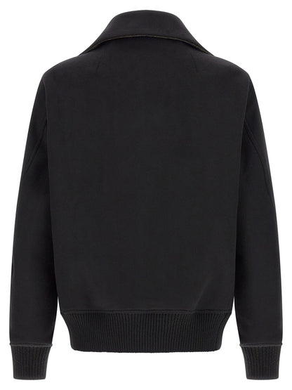 Bomber Jacket by Rick Owens for men in virgin wool black showcases a bohemian silhouette, artfully detailed with a bohemian high-neck neckline and signature pockets for a truly bohemian finish.