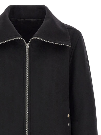This Bomber Jacket by Rick Owens for men in virgin wool black exhibits a edgy silhouette, meticulously detailed with functional pockets and a edgy high-neck neckline for a edgy finish.
