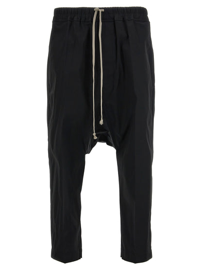 Casual Pants by Rick Owens for men in stretch cotton black features a refined silhouette with a refined cropped, defined by a and a refined cropped for a refined finish.