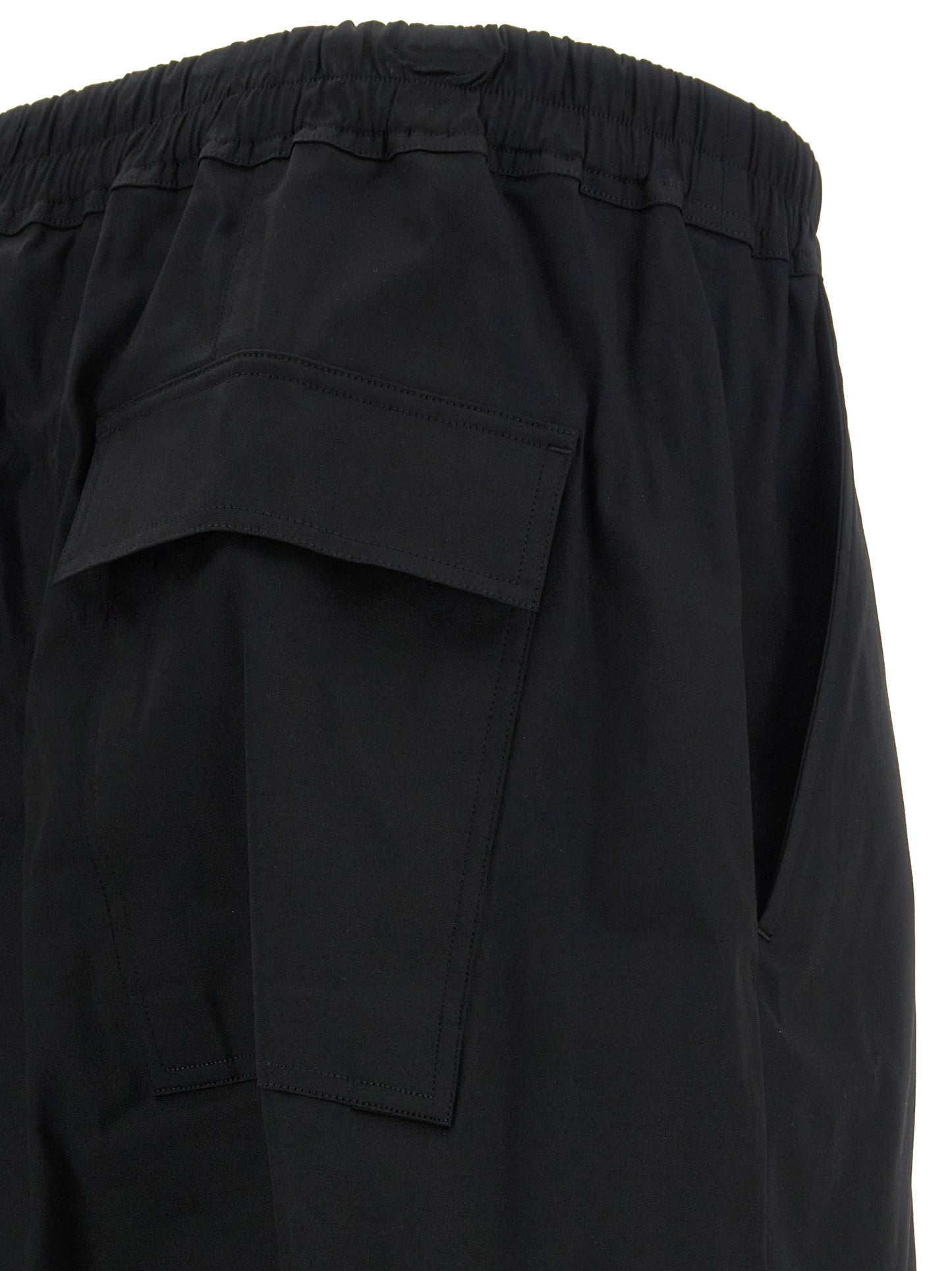 Casual Pants by Rick Owens for men in stretch cotton black features an sartorial cropped and cropped with a cut for a sartorial finish.