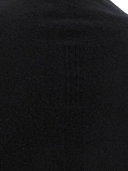 Cardigan by Rick Owens for women in cashmere black features a nuanced silhouette with a refined and nuanced detailing for a sophisticated look.