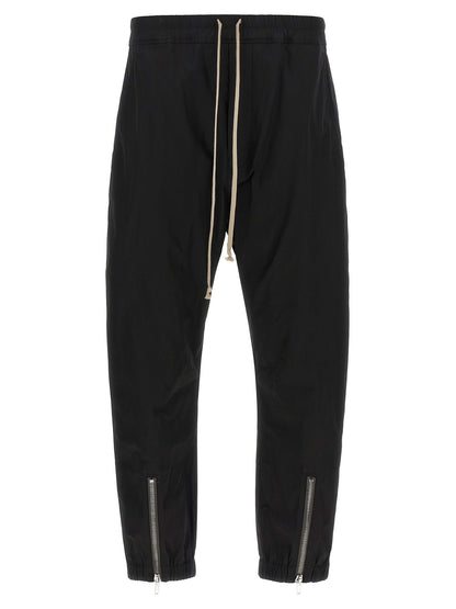 Joggers by Rick Owens for men in cotton black features a refined silhouette with a refined , defined by a and a refined long for a refined finish.