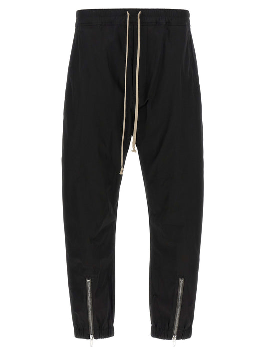 Joggers by Rick Owens for men in cotton black features a refined silhouette with a refined , defined by a and a refined long for a refined finish.