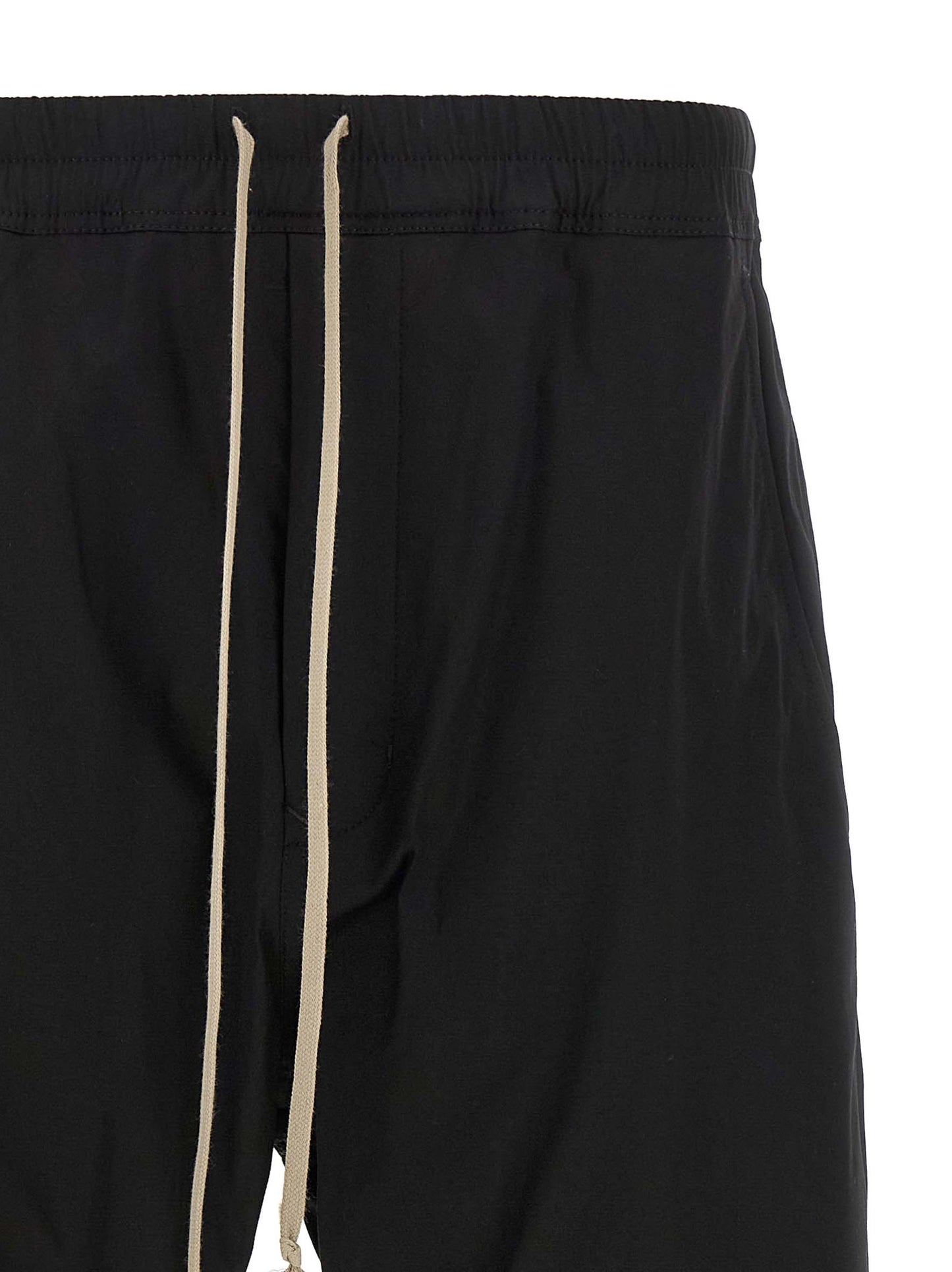 Joggers by Rick Owens for men in cotton black presents a refined pantology silhouette, artfully defined by a refined pantology , long, and a sophisticated .