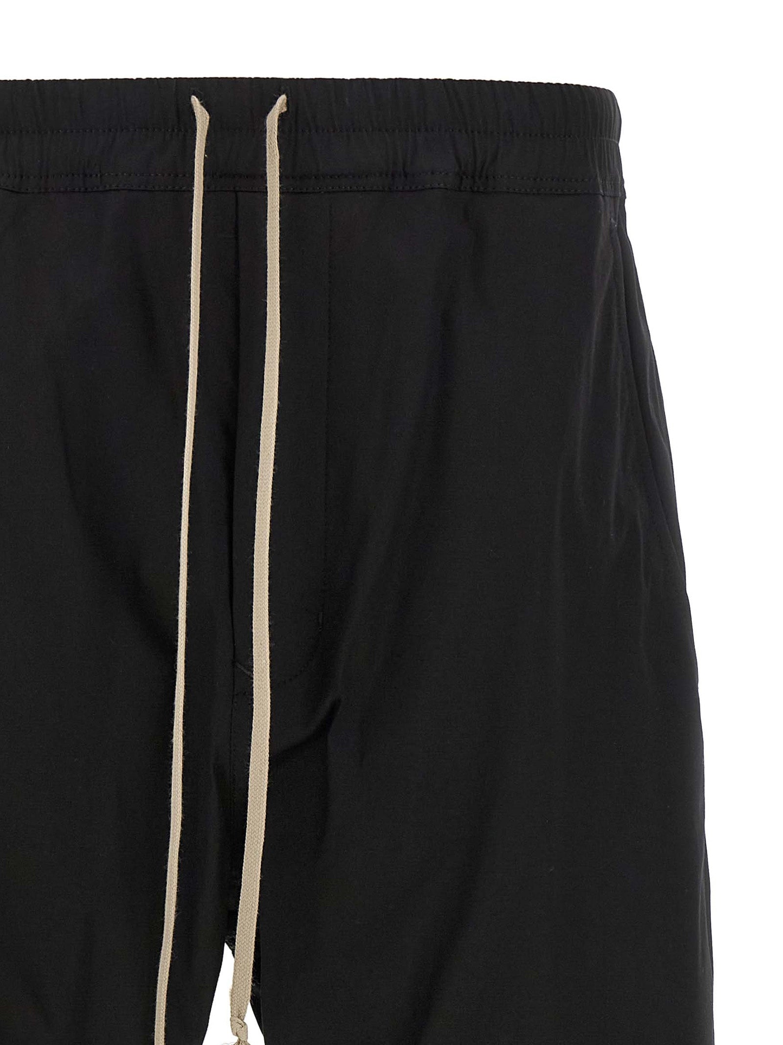 Joggers by Rick Owens for men in cotton black presents a refined pantology silhouette, artfully defined by a refined pantology , long, and a sophisticated .