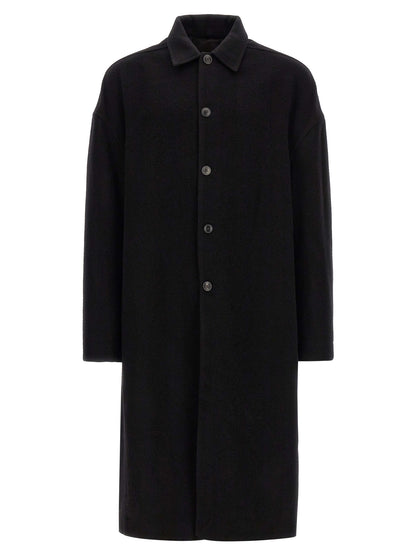Overcoat by Rick Owens for men in virgin wool black features a cosy chic silhouette, artfully detailed with a sophisticated split shirt-collar neckline and premium pockets for a cosy chic finish.