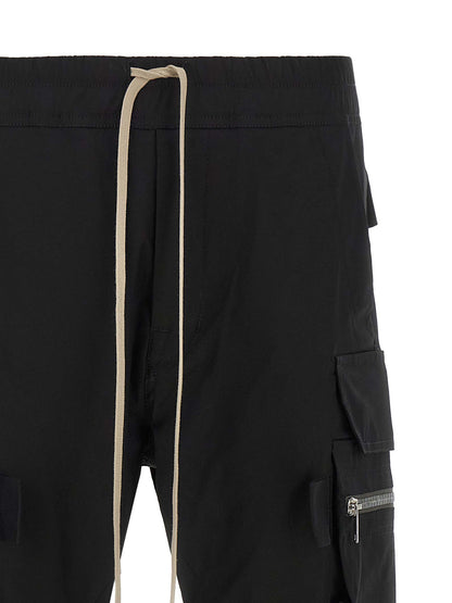 Cargo Pants by Rick Owens for men in stretch organic cotton black presents a on trend silhouette, artfully finished with a on trend tapered-leg, long, and for a sophisticated look.