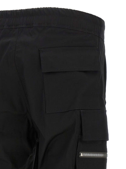 Cargo Pants by Rick Owens for men in stretch organic cotton black features an stylish tapered-leg with a long and , expertly finished with stylish utility detailing.