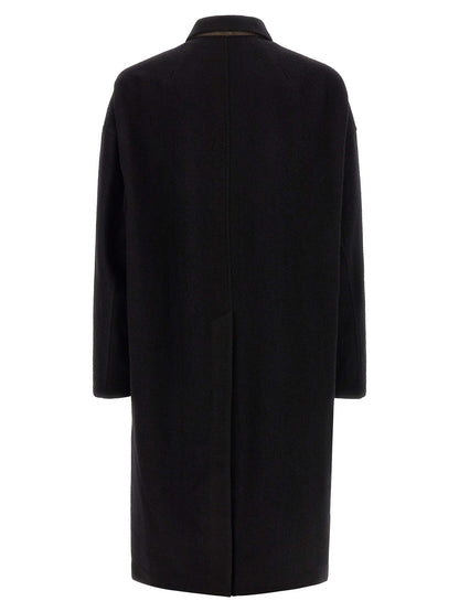Overcoat by Rick Owens for men in virgin wool black features a contemporary silhouette showcasing a contemporary split shirt-collar neckline and refined pockets for a sophisticated finish.