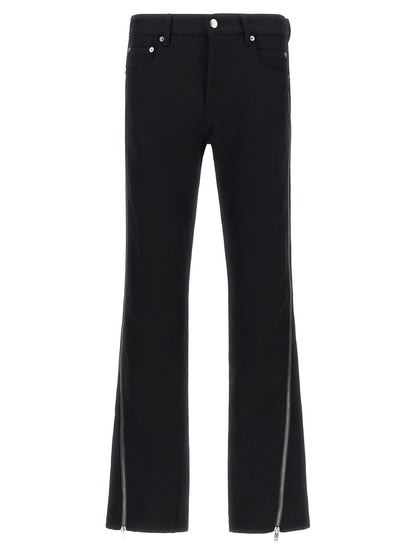 Pants by Rick Owens for men in virgin wool black & herringbone features a utilitarian straight-leg with a utilitarian long and low rise to create a sophisticated, premium look.