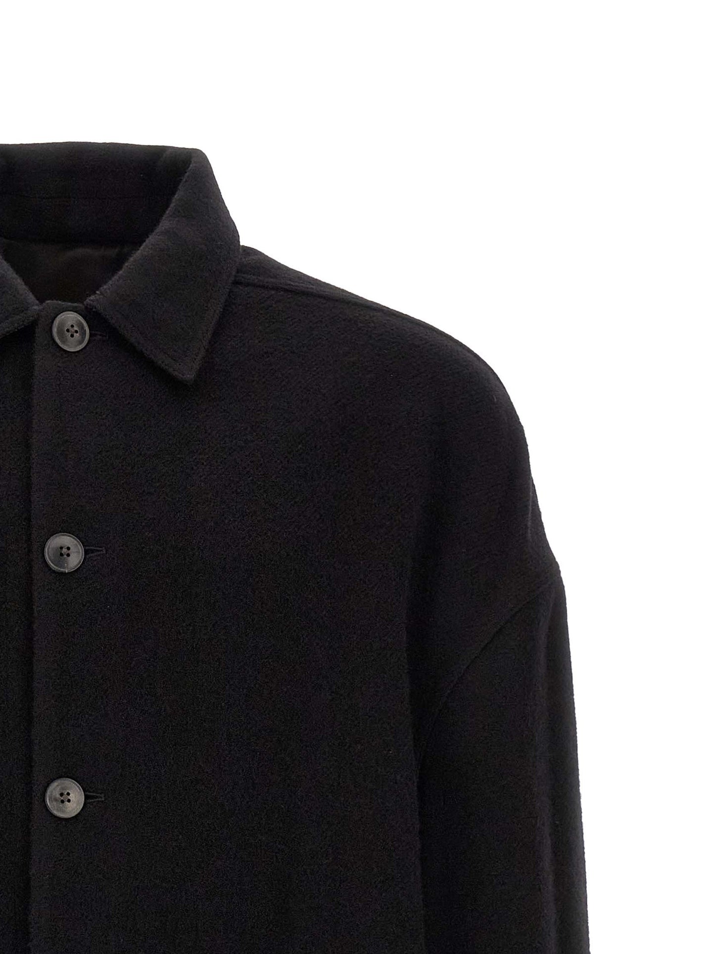 Overcoat by Rick Owens for men in virgin wool black features an satoral silhouette, showcasing a sophisticated split shirt-collar neckline and satoral pockets for a premium, timeless look.