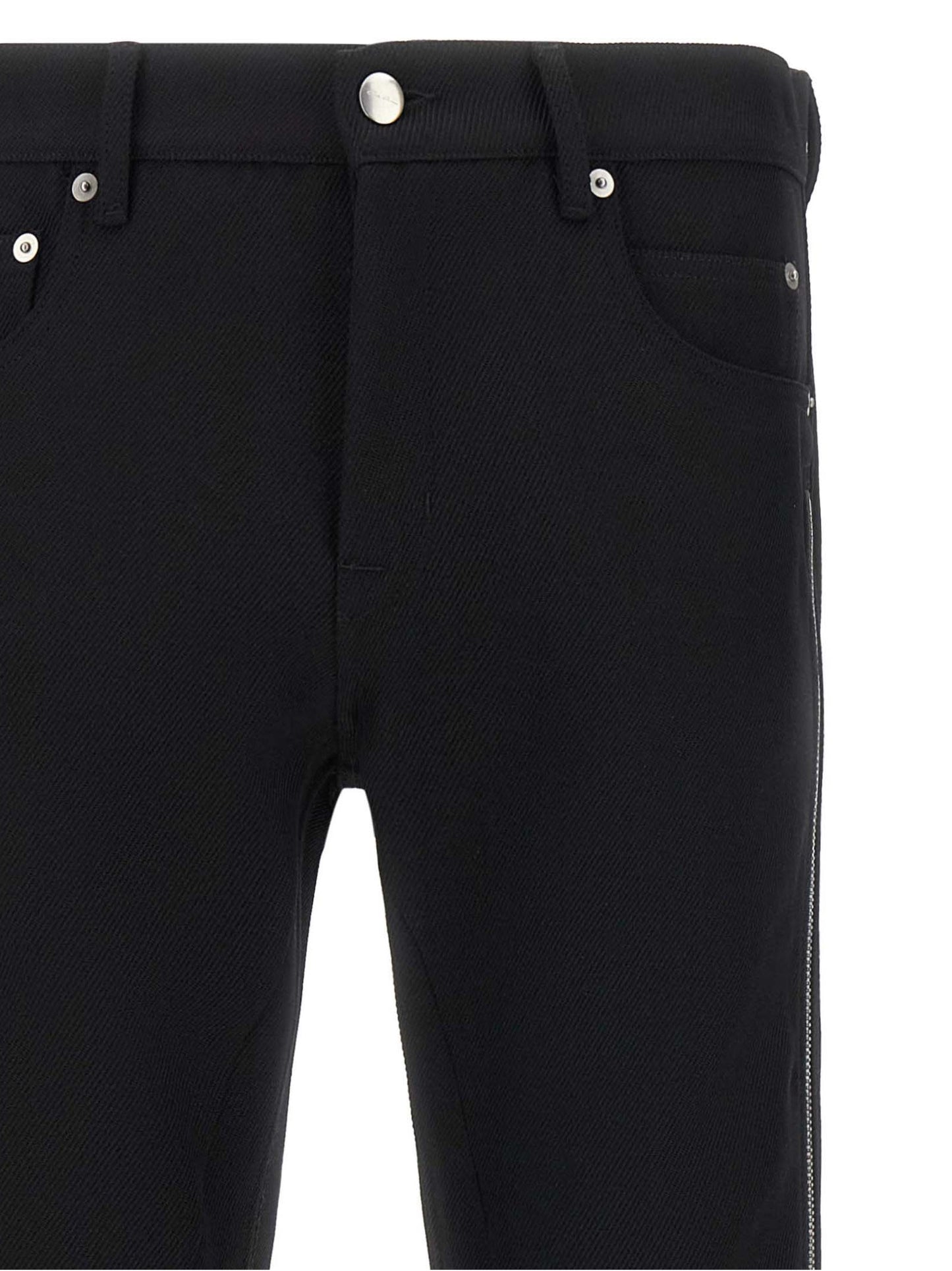 Pants by Rick Owens for men in virgin wool black & herringbone features an on trend silhouette with a low rise and straight-leg cut in an elegant long for a sophisticated look.