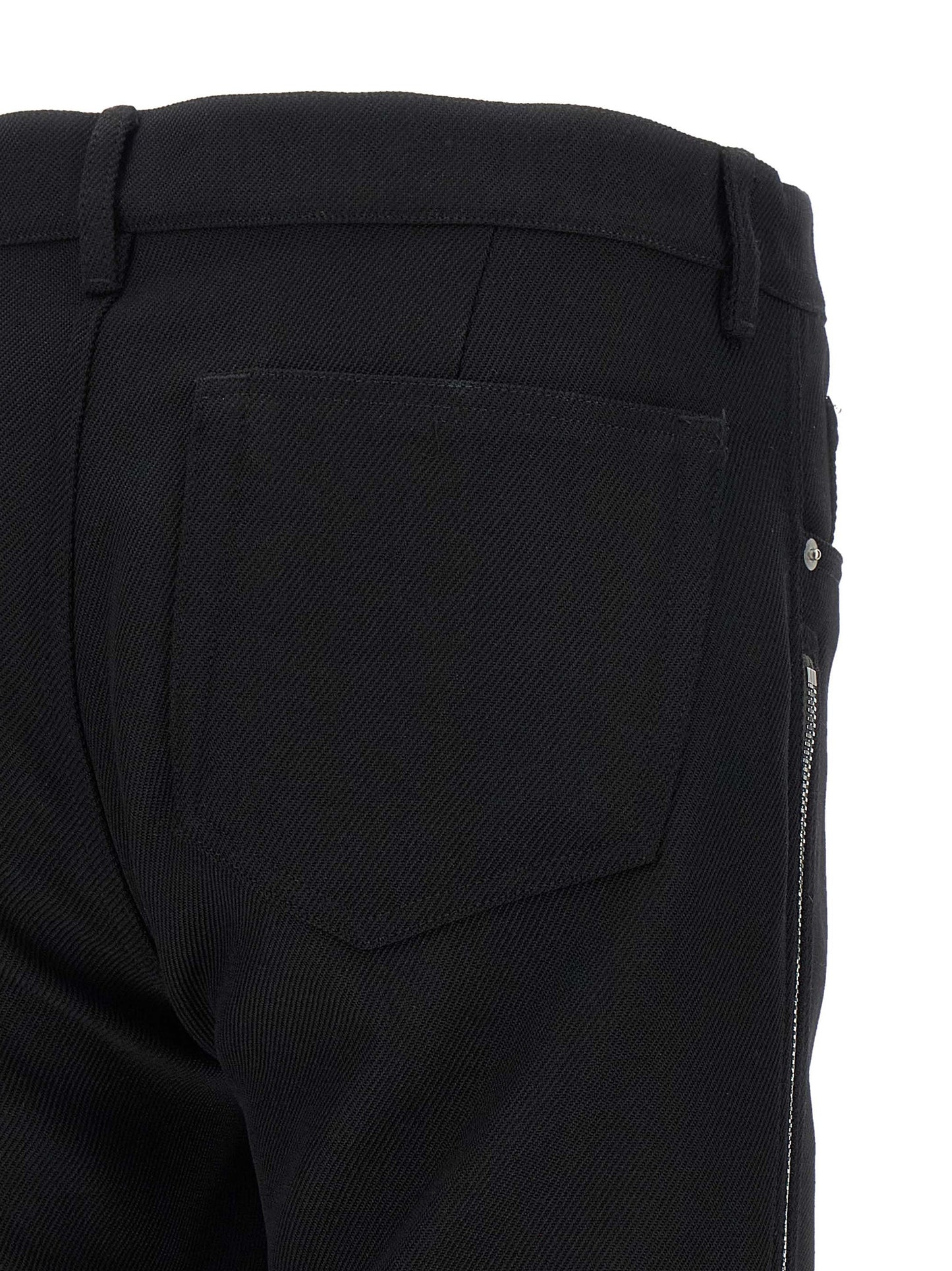 Pants by Rick Owens for men in virgin wool black & herringbone features a stylish silhouette with a stylish straight-leg, long, and low rise.
