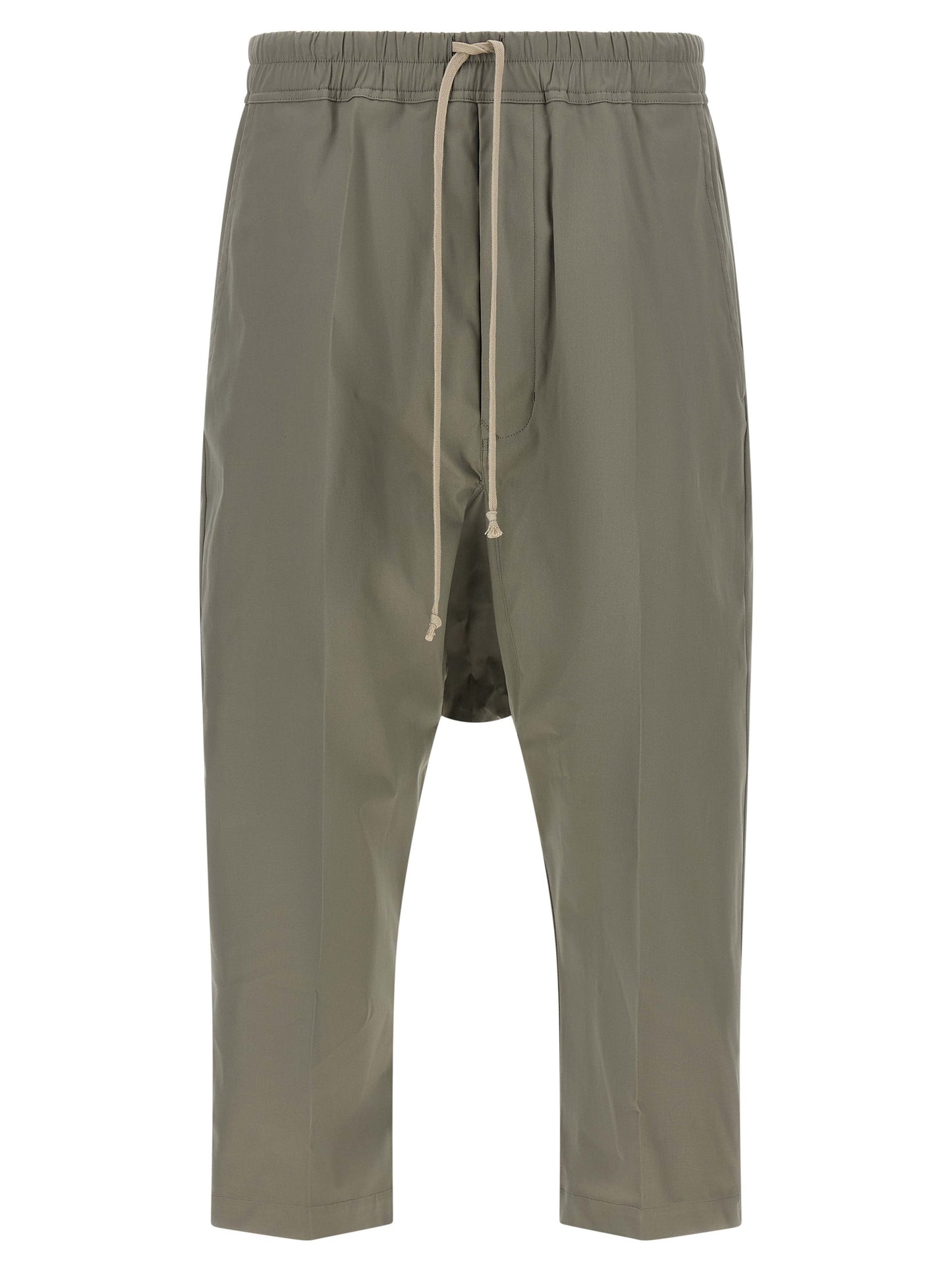 Trousers by Rick Owens for men in organic cotton gray presents a smart silhouette, meticulously detailed with a smart cropped, a smart cropped, and a smart .