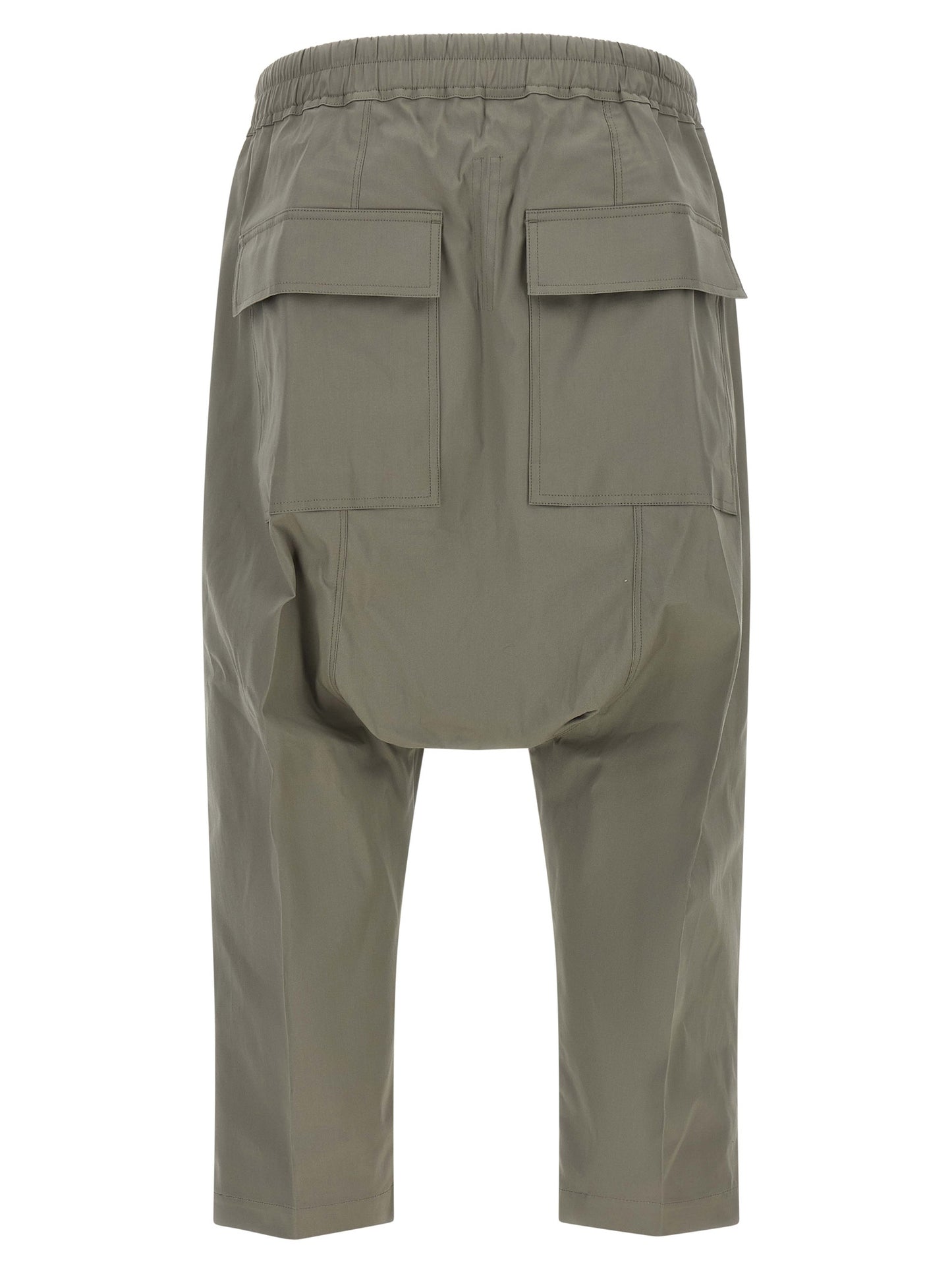 Trousers by Rick Owens for men in organic cotton gray features an sartorial silhouette, showcasing a precise cropped and cropped with a sartorial for a refined look.