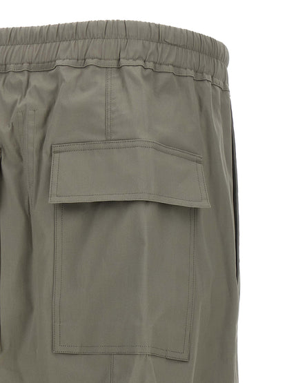 Trousers by Rick Owens for men in organic cotton gray presents a perennial silhouette, meticulously tailored with a cropped cut, cropped finish, and an elegant .