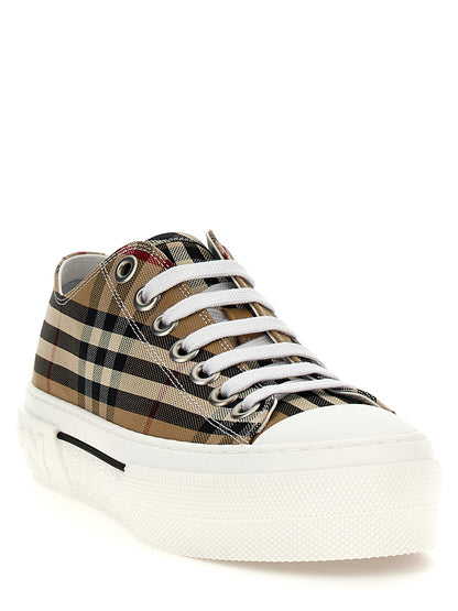 Sneakers by Burberry for women in calf leather & cotton canvas beige, patterned, signature & print presents a sumptuous silhouette, artfully capturing the essence of the Women's Low Top Calf Leather & Cotton Canvas Sneakers with its sumptuous low-top style design.