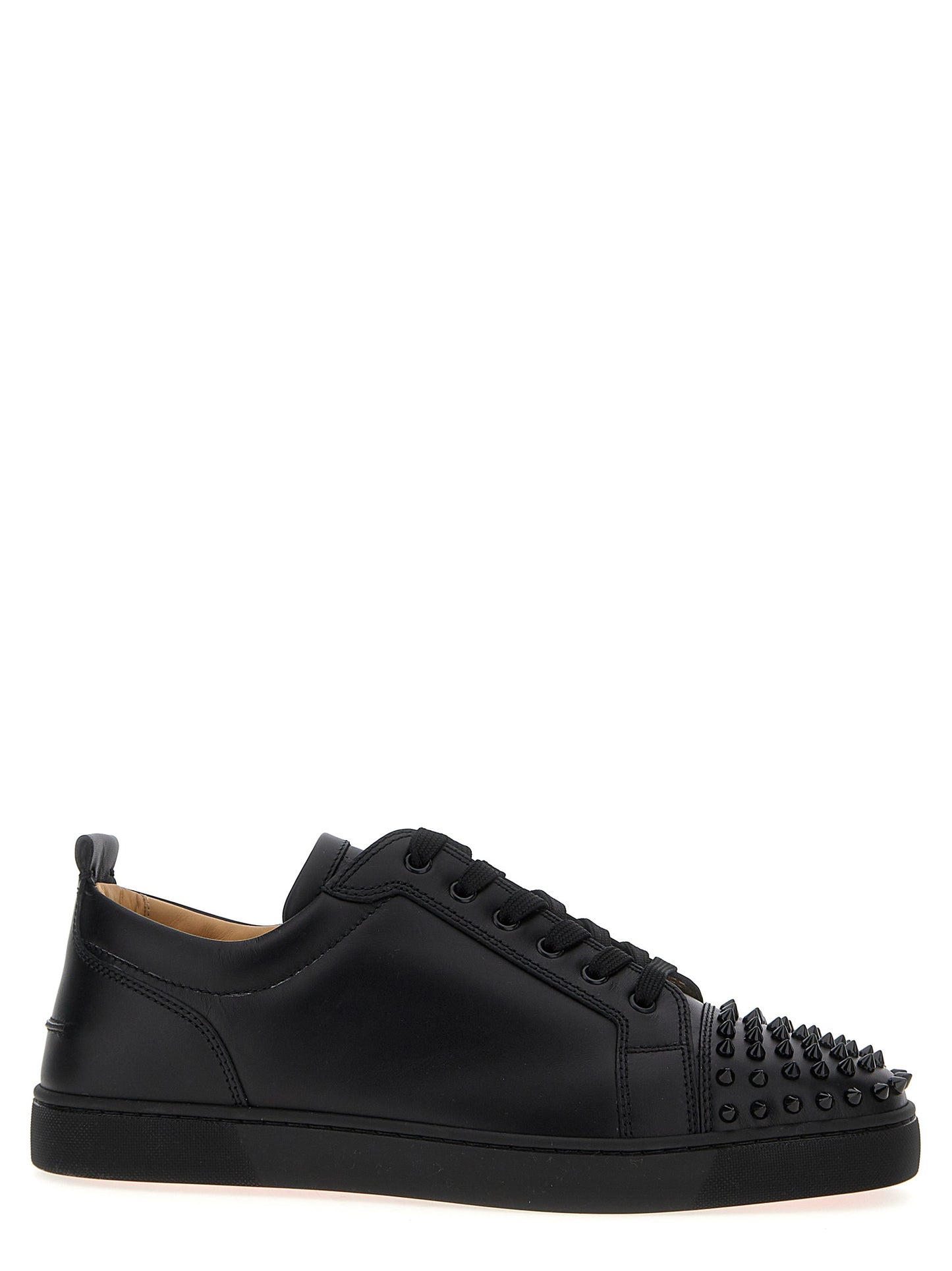 Sneakers by Christian Louboutin for men in calfskin leather black features a chic design, perfectly showcasing the chic low-top style of this Louis Men's Low Top Calfskin Leather Sneakers.
