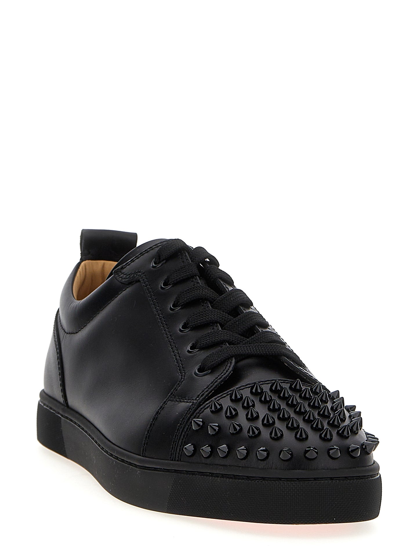 Sneakers by Christian Louboutin for men in calfskin leather black features an timeless silhouette from the Louis Men's Low Top Calfskin Leather Sneakers collection, showcasing a signature low-top style with an timeless finish.