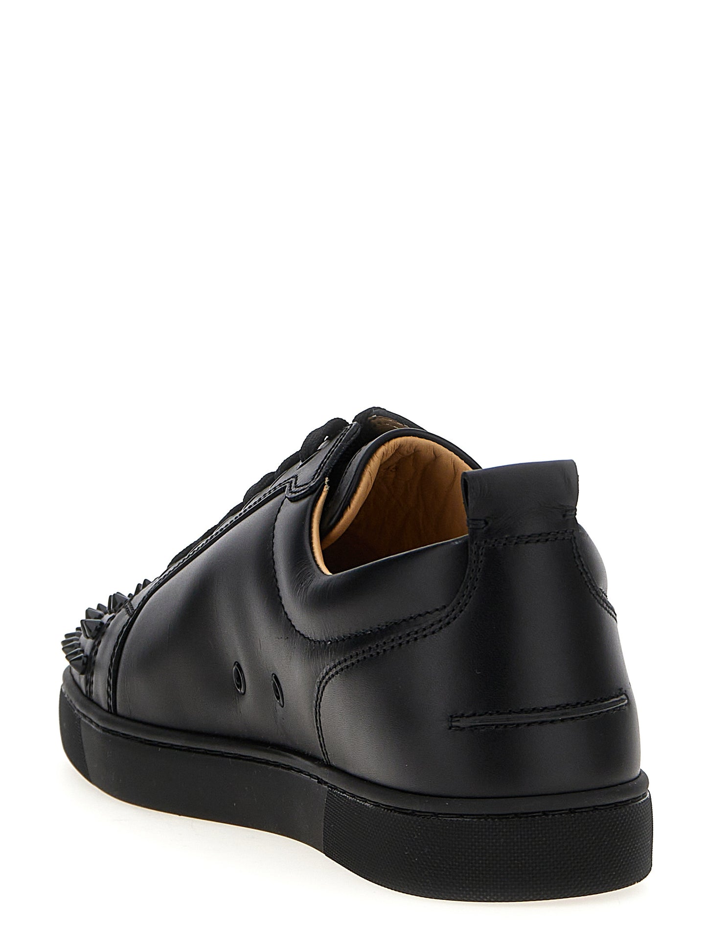 Sneakers by Christian Louboutin for men in calfskin leather black features an versatile design from the Louis Men's Low Top Calfskin Leather Sneakers collection, highlighting a versatile low-top style for a premium, high-fashion look.