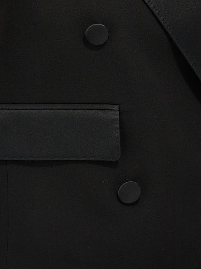 Vest by Dolce & Gabbana for women in virgin wool silk & polyester black features a stylish silhouette, showcasing distinct insulated and a refined for a truly stylish finish.