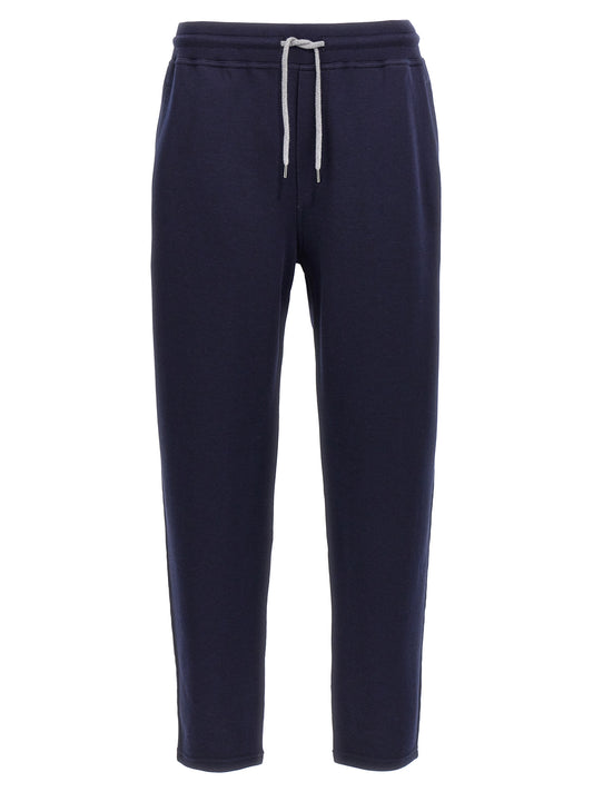 Joggers by Brunello Cucinelli for men in silk cotton & cashmere blue features a polished silhouette with a polished , reaching a polished long and finished with a polished .