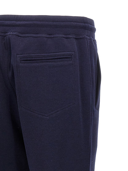 Joggers by Brunello Cucinelli for men in silk cotton & cashmere blue features an refined tailoring silhouette, showcasing a premium with a and long cut for a refined tailoring look.