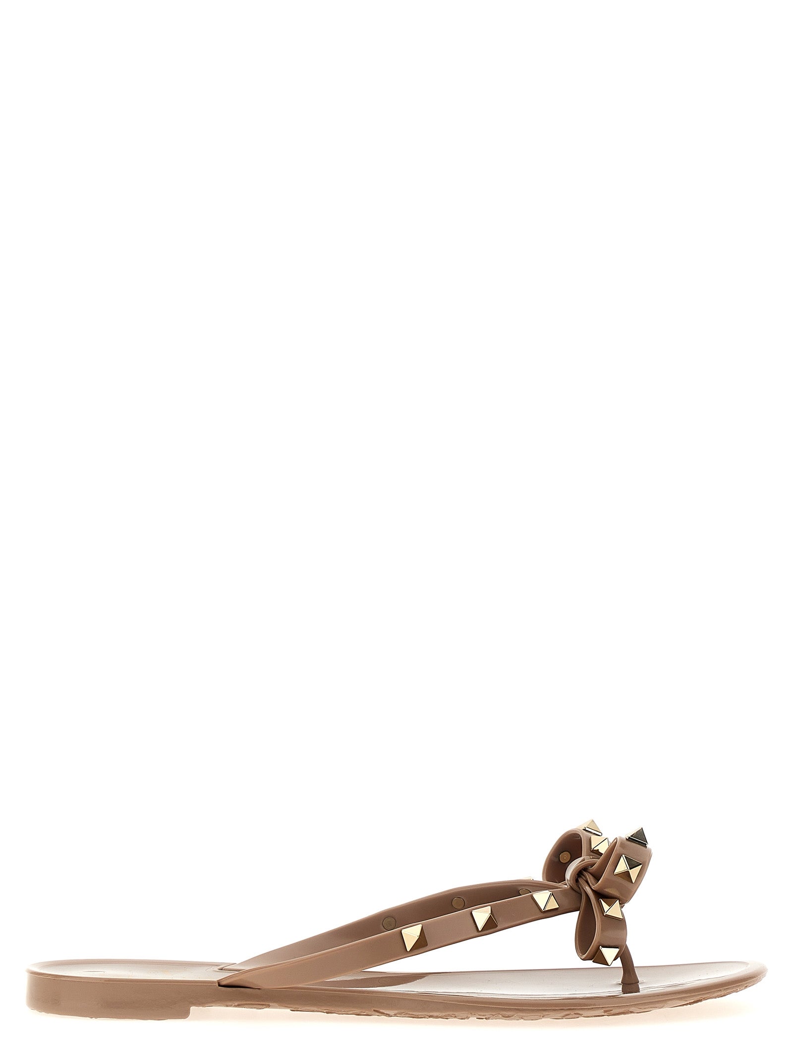 Sliders Sandals Flat Shoes by Valentino Garavani for women in pvc multicolor, pink & patterned features an captivating silhouette, showcasing the captivating style of the City Rockstud Women's PVC Sliders Sandals Flat Shoes with its distinct and refined .