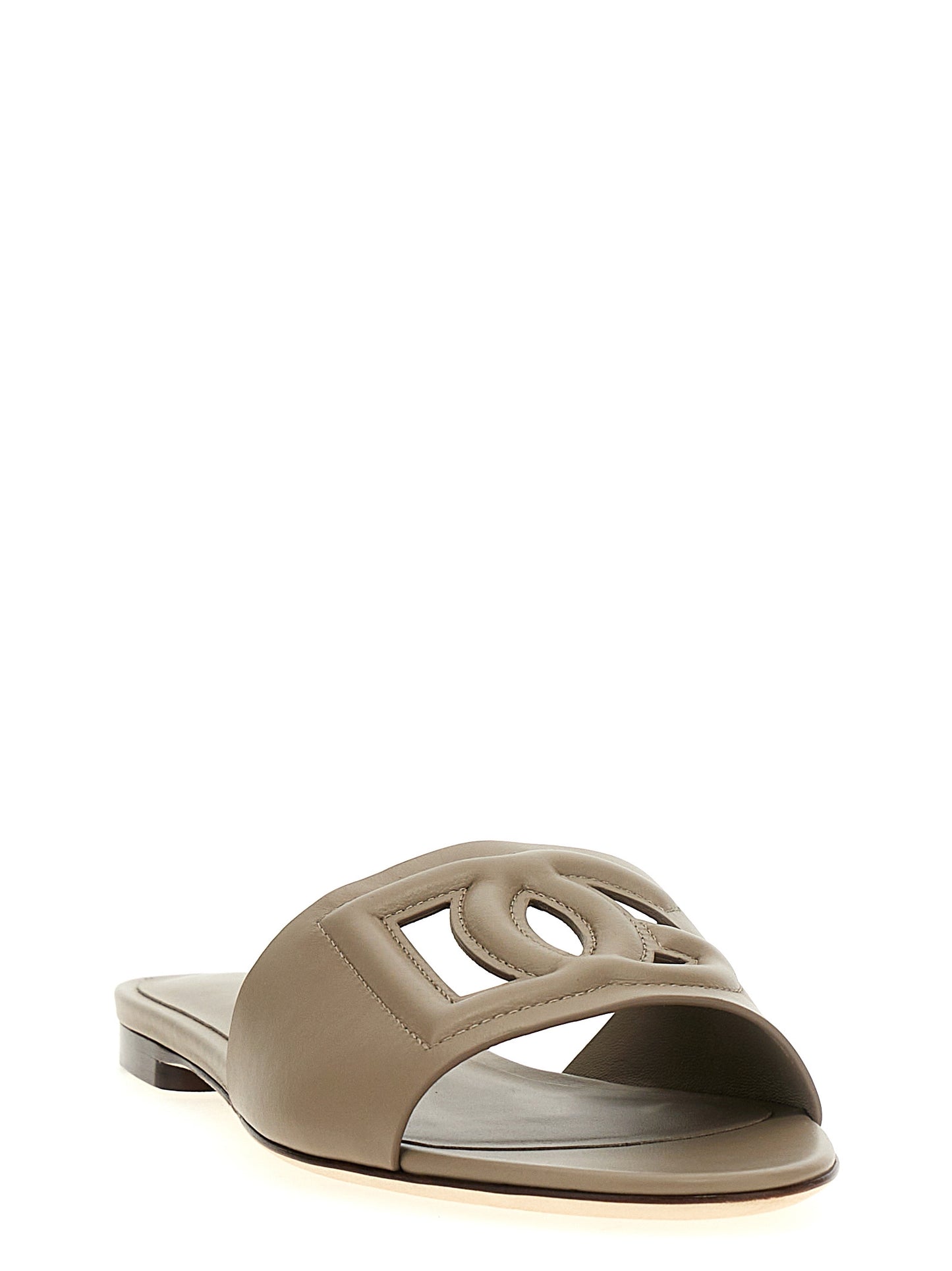 Sliders Flat Shoes by Dolce & Gabbana for women in calfskin leather gray showcases a resplendent Women's Calfskin Leather Sliders Flat Shoes aesthetic with a and .