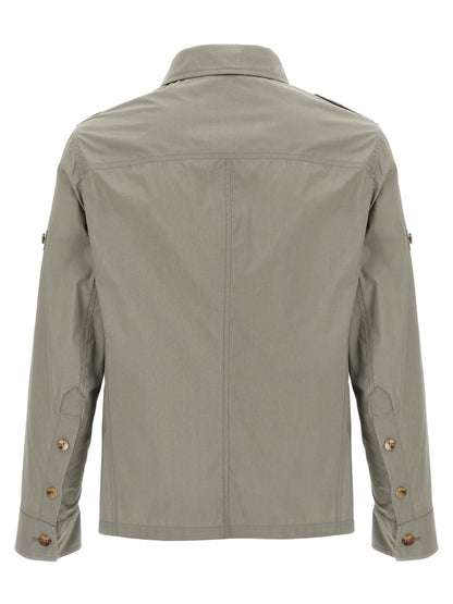 Windbreaker Jacket by Brunello Cucinelli for men in polyamide & cotton bicolour & green showcases a urban chic silhouette, detailed with a urban chic shirt-collar neckline and functional pockets & windproof for a polished finish.