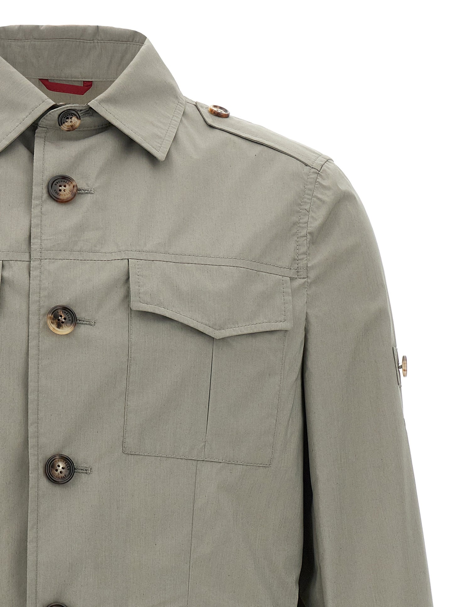 Windbreaker Jacket by Brunello Cucinelli for men in polyamide & cotton bicolour & green presents a resilient silhouette, artfully detailed with a sophisticated shirt-collar neckline and functional pockets & windproof for a resilient finish.