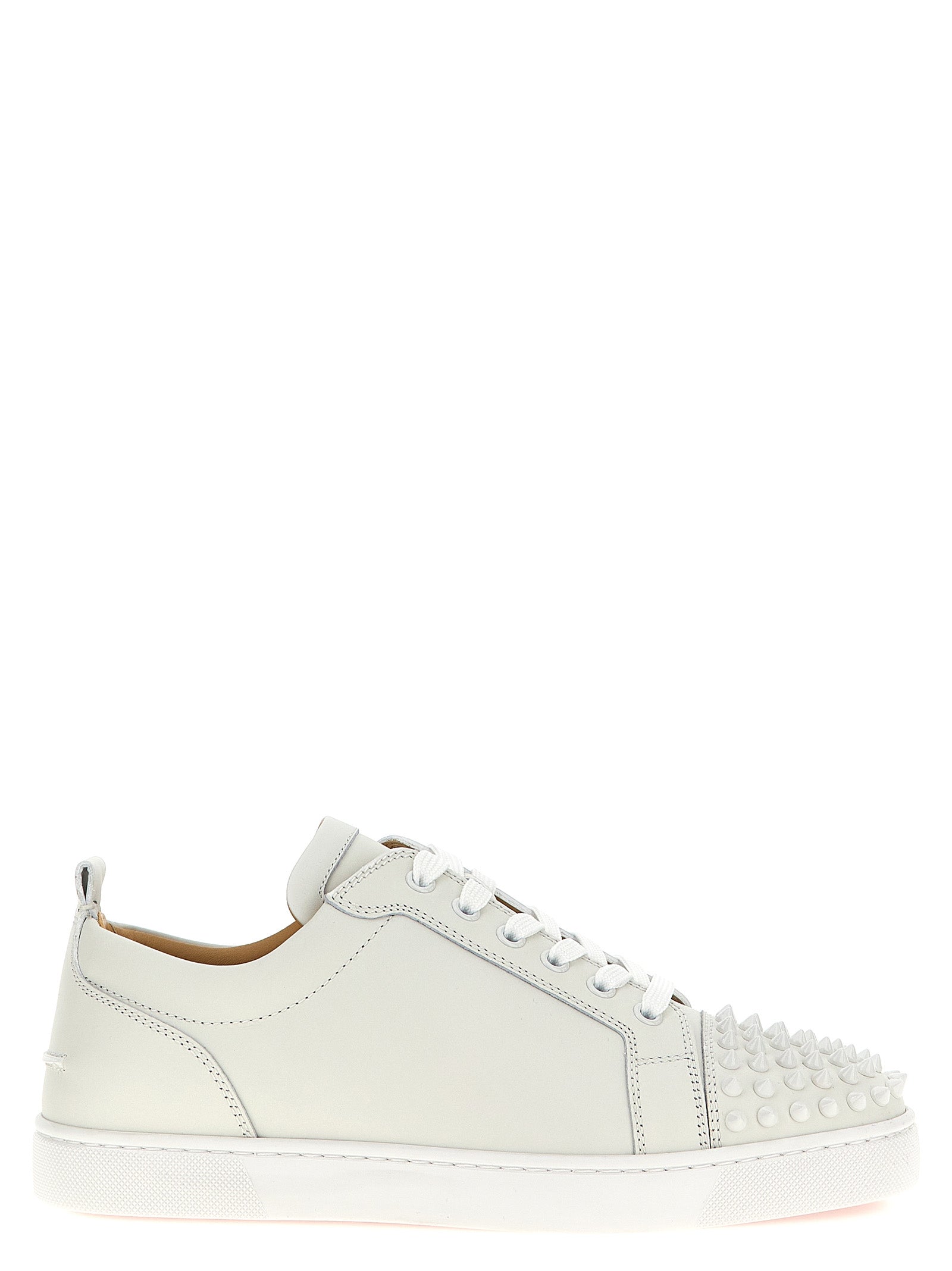 Sneakers by Christian Louboutin for men in calfskin leather white features an versatile design from the Louis Men's Low Top Calfskin Leather Sneakers collection, highlighting a versatile low-top style for a premium, high-fashion look.