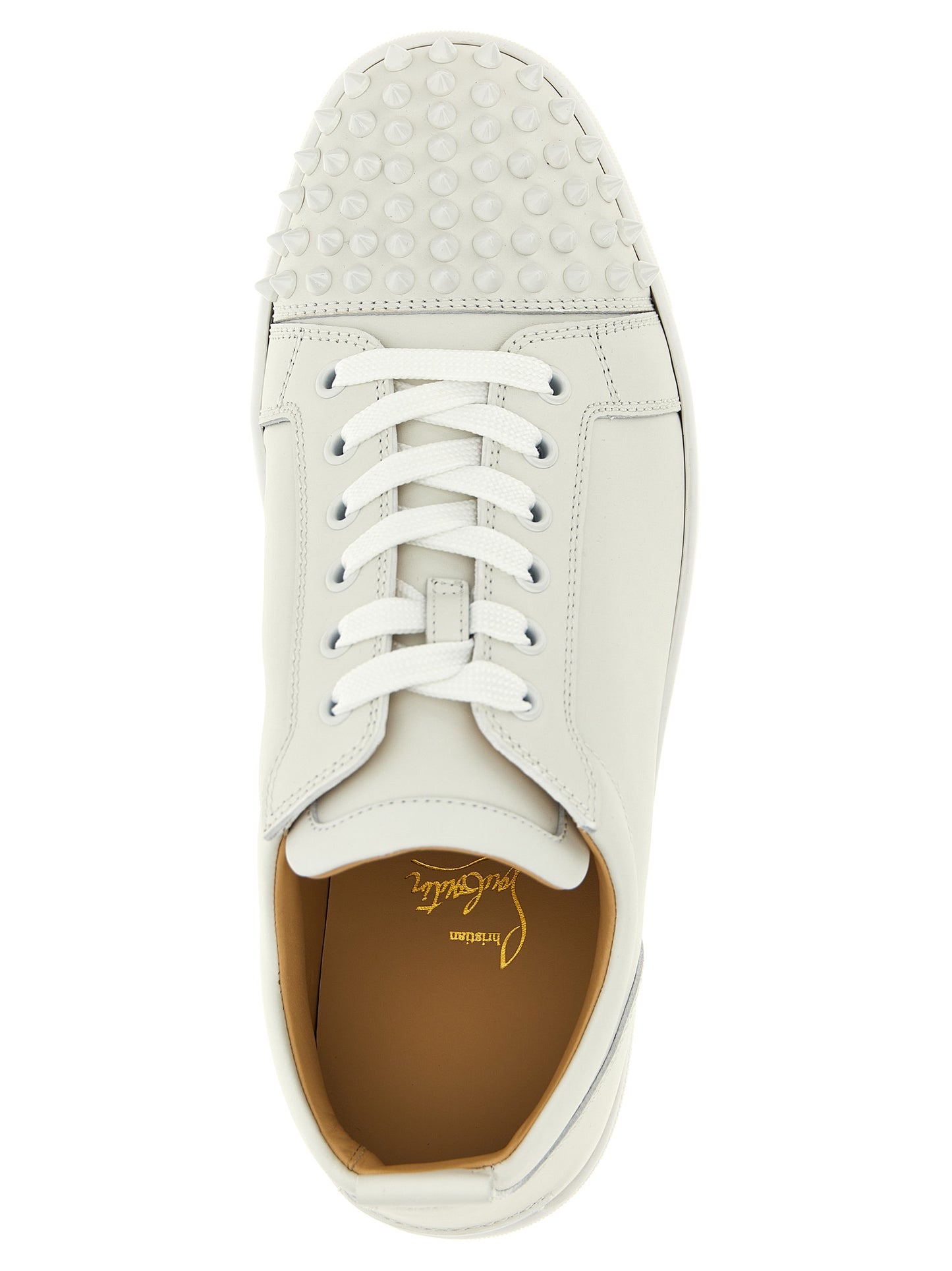 Sneakers by Christian Louboutin for men in calfskin leather white presents a sumptuous silhouette, artfully capturing the essence of the Louis Men's Low Top Calfskin Leather Sneakers with its sumptuous low-top style design.