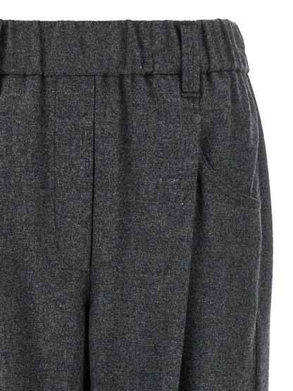 Trousers by Brunello Cucinelli for women in cashmere virgin wool gray presents a perennial silhouette, meticulously tailored with a wide cut, long finish, and an elegant .