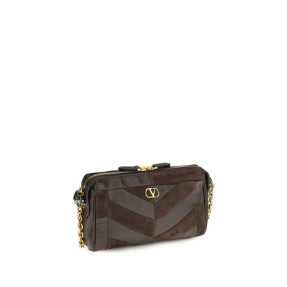 Shoulder Bag by Valentino Garavani for women in bio-acetate enamel & bos taurus calf leather brown, gold, patterned, chevron & signature features a effortless sophistication silhouette, secured by a zipper with ample single-compartment and versatile shoulder-strap & adjustable-strap for a effortless sophistication finish.