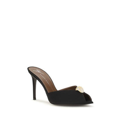 Stiletto Mules Sandals by Giuseppe Zanotti for women in bos taurus calf leather & rhinestone black & gold features an statuesque Women's Bos Taurus Calf Leather & Rhinestone Stiletto Mules Sandals silhouette with a refined stiletto and elegant pointed toe style.