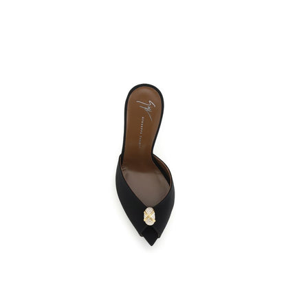 Stiletto Mules Sandals by Giuseppe Zanotti for women in black & gold features an architectural design from the Women's Bos Taurus Calf Leather & Rhinestone Stiletto Mules Sandals collection, defined by a architectural stiletto and pointed toe style for a architectural finish.